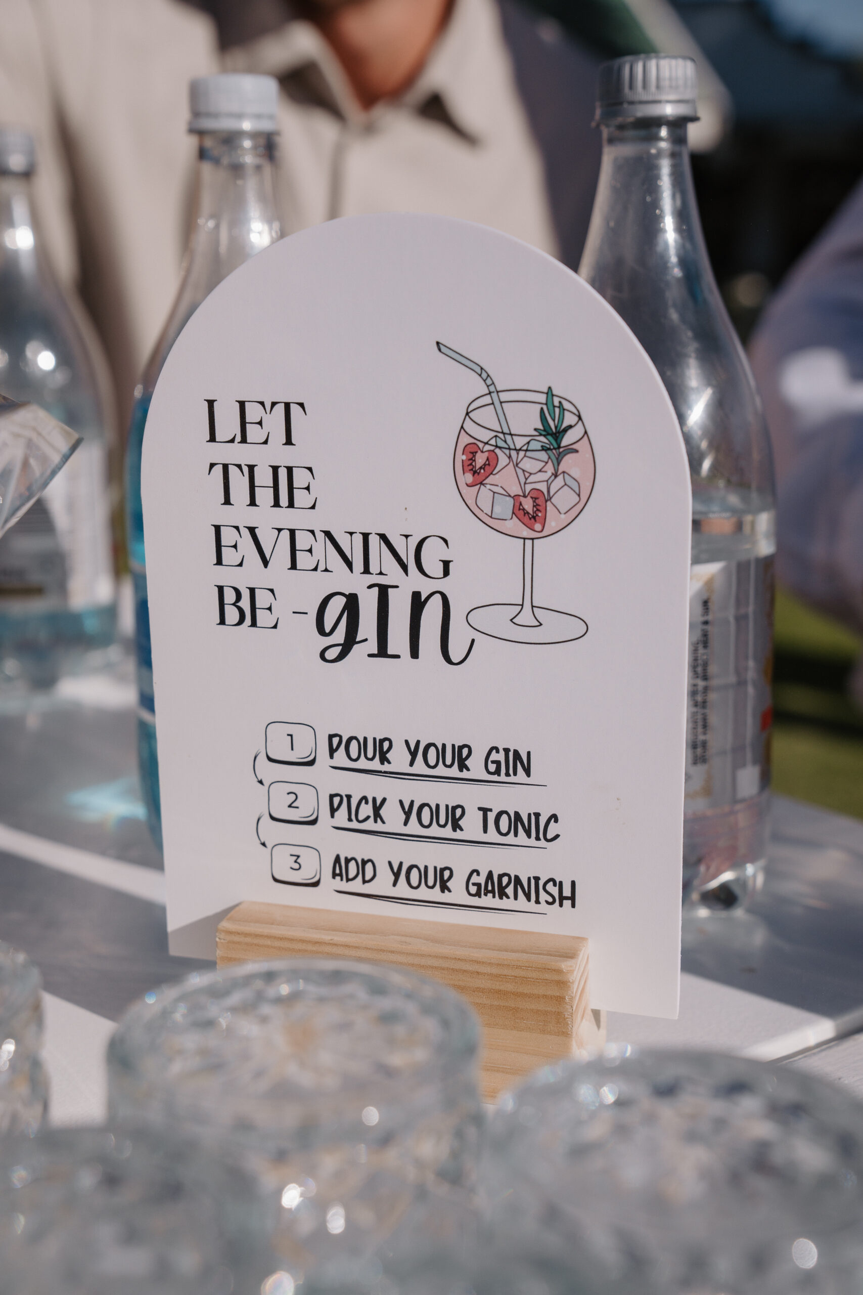 Let the evening be-gin wedding bar sign